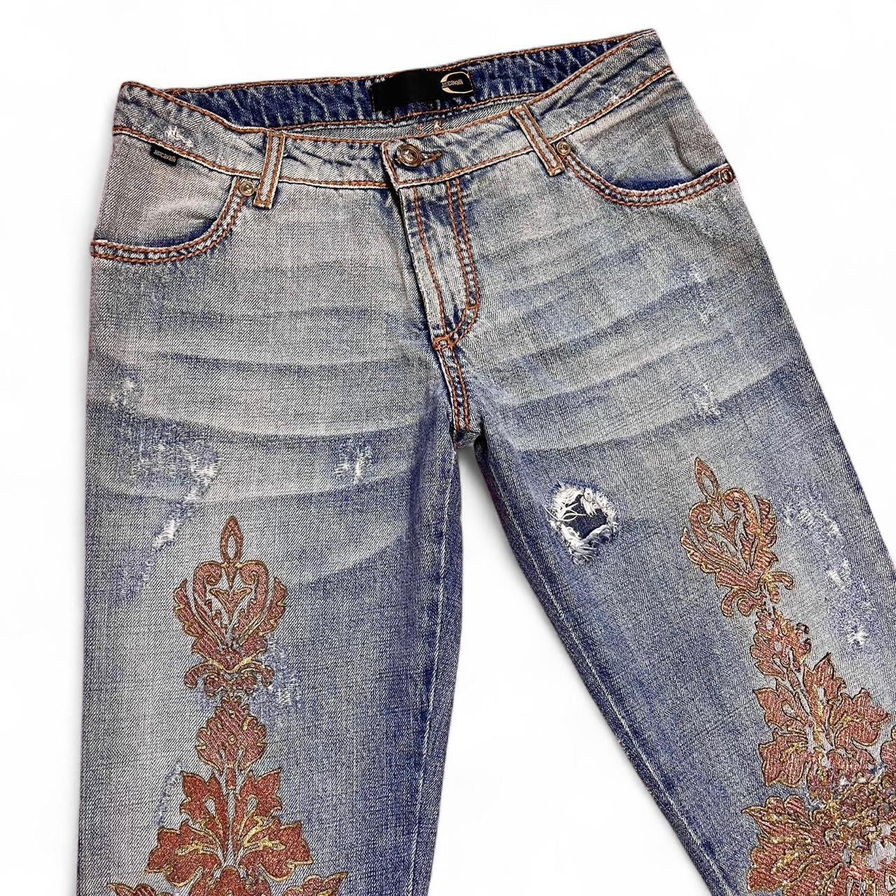 Distressed copper appliqué jeans