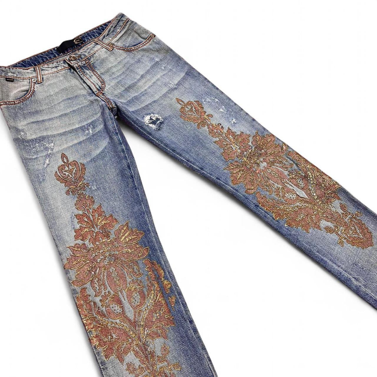 Distressed copper appliqué jeans