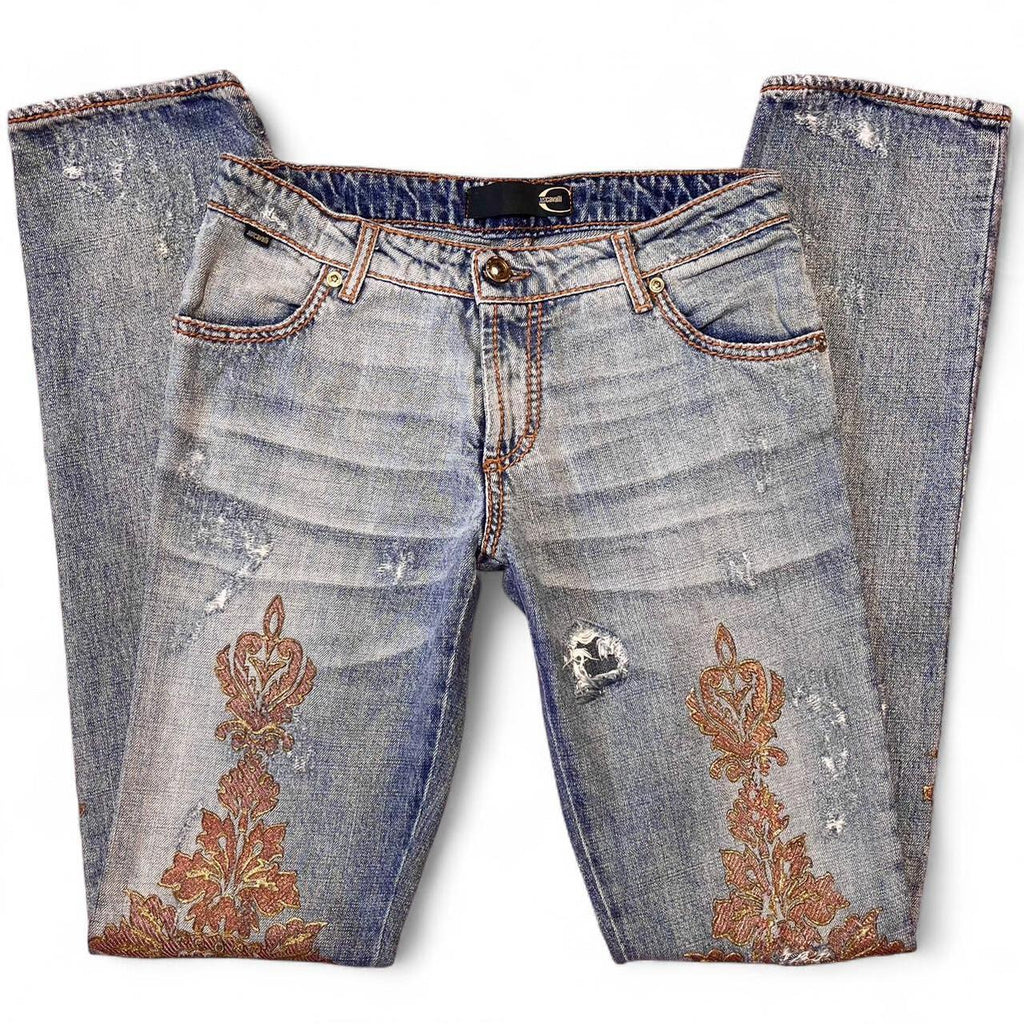 Distressed copper appliqué jeans