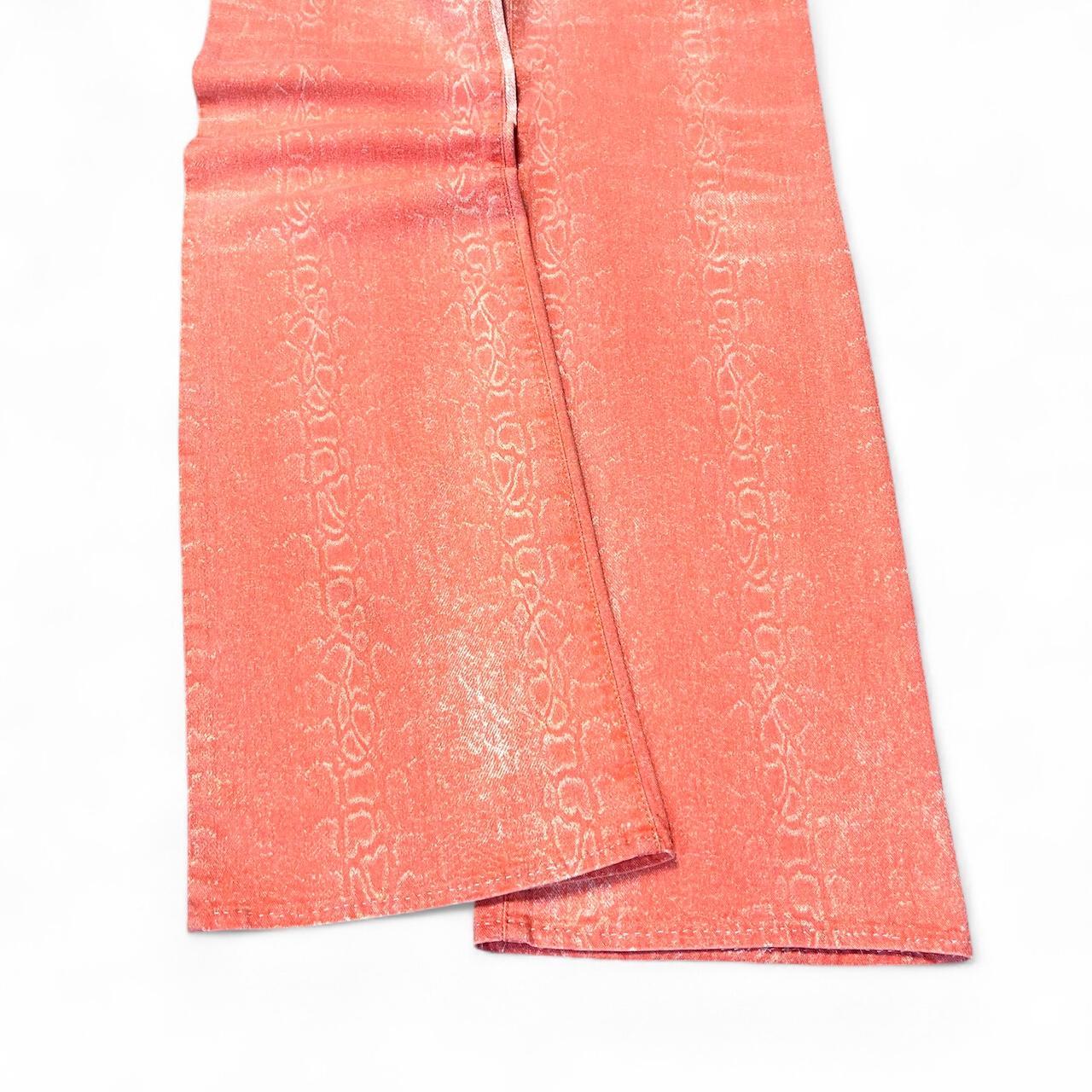 Ombré salmon snakeskin jeans
