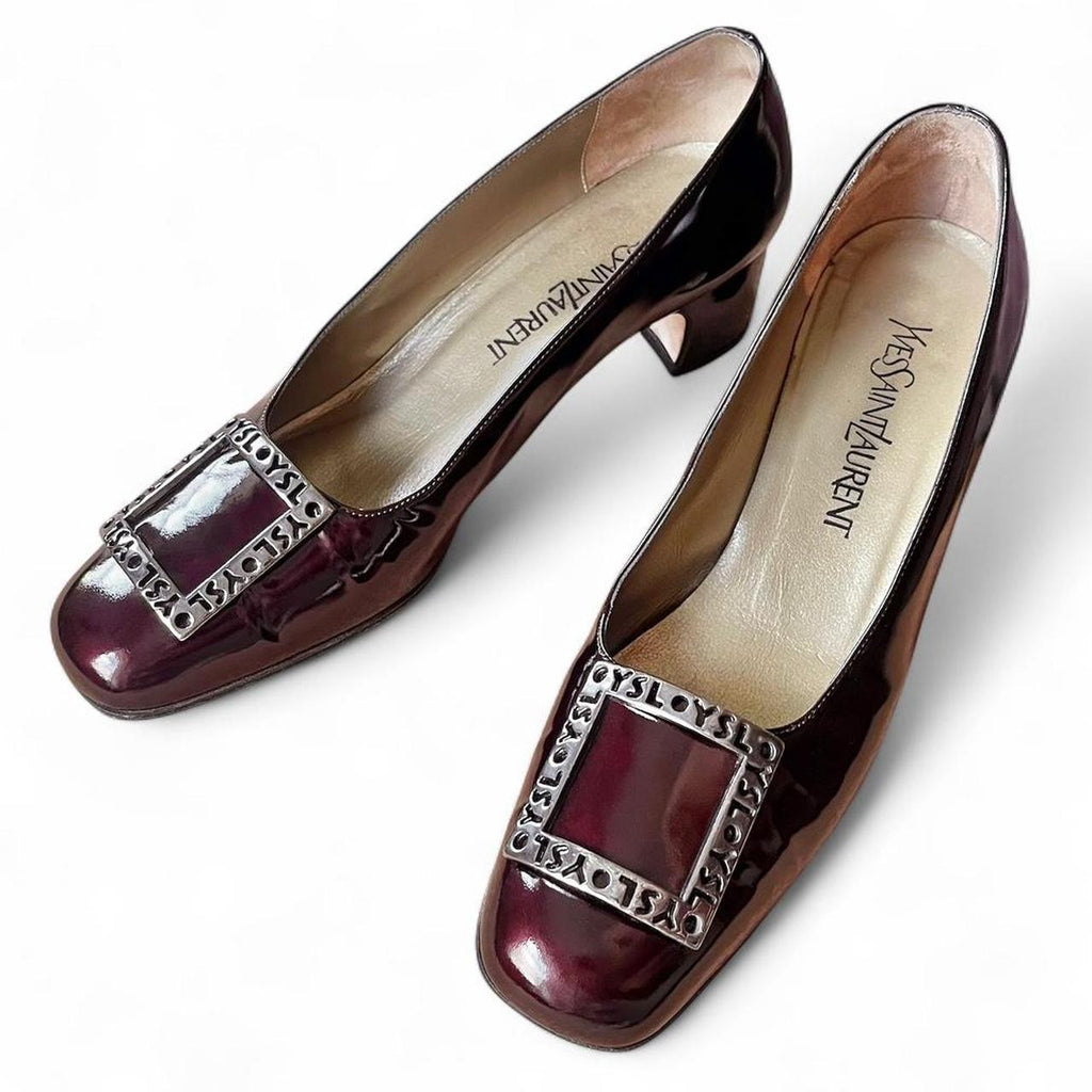 Burgundy patent leather pumps with logo buckle (US 8.5)