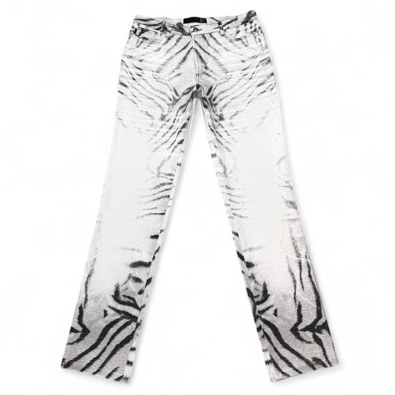 White jeans with black abstract pattern on a white background