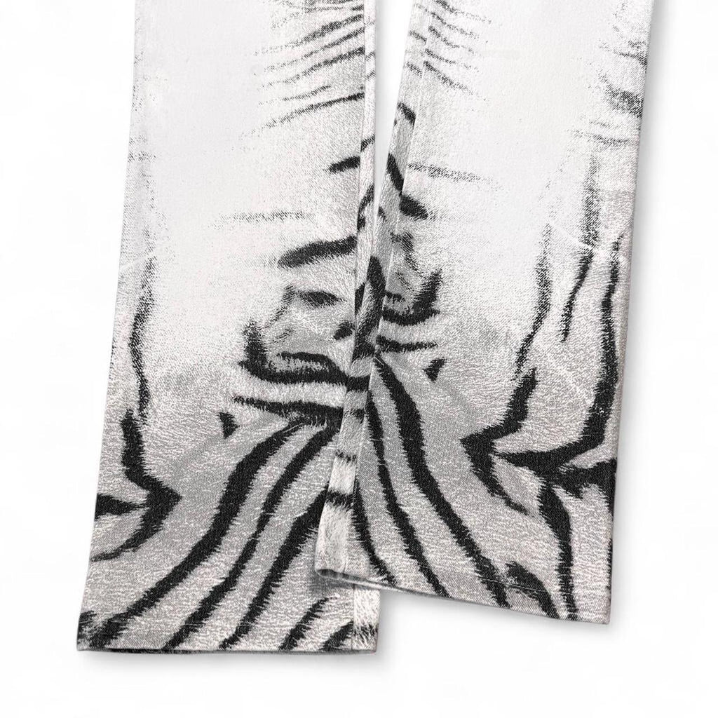 Two zebra-striped towels on a white background